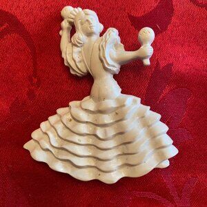 1950's White Pin of a Women with Maracas Dancing possibly the Merengue
